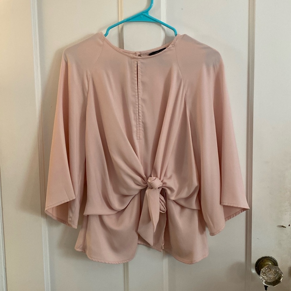 Top shop dusty rose top with bow. Cute for going out or business casual office.